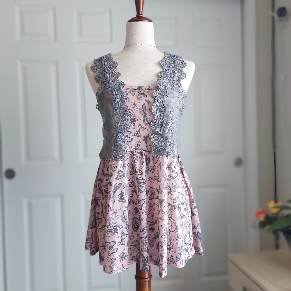 Butterfly patterned dress with lace vest